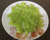 A picture of step 1 of Chilli and grapes Pickle.