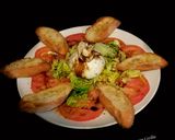 Foto del paso 1 de la receta Ensalada con burrata y tostas de pan de ajo