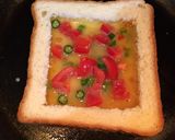 A picture of step 5 of Cheese Tomato Egg Toast.