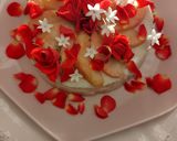 A picture of step 2 of Peach mousse, red roses and white flowers bouquet.