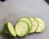 A picture of step 1 of Baigani or baigan Bara.