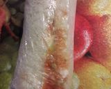 A picture of step 6 of Bread pin wheel sandwich.