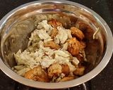 A picture of step 12 of Crab and Shrimp Enchiladas with Hatch Chili Sauce.
