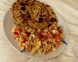 A picture of step 6 of Buttered Paratha with scrambled egg.