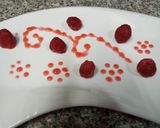 A picture of step 5 of Raspberry glaze or sauce.