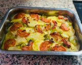 Foto del paso 3 de la receta: Lubina en tartera 🐟 🍅 🫑 🧅 🧄 🥔 🐟