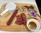 A picture of step 1 of Chinese Sausage In Coconut milk.