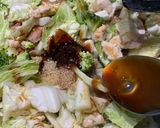 A picture of step 6 of Thai style Stir-fried rice noodles with chicken and sausages.