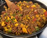 Une image de l'étape 12 de Bœuf aux poivrons bicolores,tomates,herbes et épices.