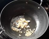 A picture of step 3 of Munagaaku Fry(Drumstick Leaves Fry).