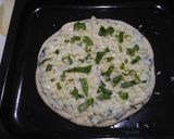 A picture of step 7 of Spinach Alfredo pizza (homemade base).
