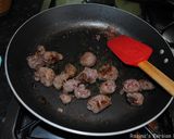 A picture of step 1 of Venison sausages risotto.