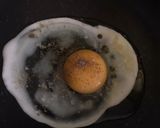 A picture of step 1 of Cheesy egg toast.