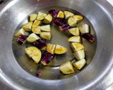 A picture of step 1 of Potato-Brinjal Curry.