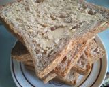 A picture of step 3 of Egg and cheddar toasted sandwich.
