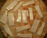 Foto del paso 7 de la receta: Pizza de hojaldre con ternera picada y champiñones