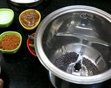 A picture of step 2 of Kaisasive chitranna / coconut mustard rice.