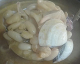 Foto del paso 10 de la receta: Alubias con calamares y almejas
