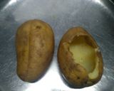 A picture of step 1 of Steamed and baked stuff potatoes.