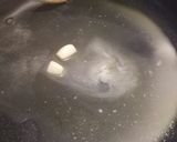 A picture of step 2 of Brandy, garlic and butter mussels.