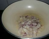 A picture of step 2 of Aaloo bangan with white rice.