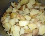 A picture of step 5 of Onion fried potatoes with fish and greens.