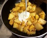 A picture of step 5 of Dahi ke Aloo.