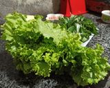 Hình bước làm 3 của món Cá nục, mực hấp cuốn bánh tráng
