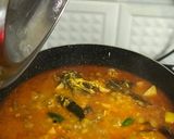 A picture of step 5 of Muri Ghonto: Bengali Yellow Rice with Fish Head.