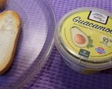 A picture of step 1 of Toasts with Cottage Cheese, Cherry Tomatoes, Guacamole, and More.