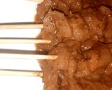 A picture of step 4 of Chicken satay with peanut sauce and mixed vegetable rice.
