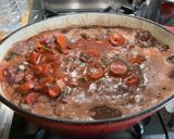 A picture of step 14 of Marinated Braised Pork Shoulder with Tomatoes and Bacon.