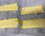 Foto del paso 3 de la receta: Napolitanas de jamón y queso rápido y sencillo con hojaldre
