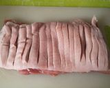A picture of step 2 of Rolled Pork belly stuffed with Sage and onion stuffing.