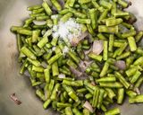 A picture of step 2 of Cluster beans Maharashtra Special Bhaji.