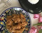 A picture of step 8 of Dahi Chicken.