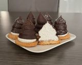 Foto del passaggio 8 della ricetta Moretti - Meringhe al Dulce de Leche e Cioccolato