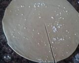 A picture of step 2 of Puri paratha in tawa style.