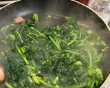 A picture of step 1 of Pan-Seared Scallops with Broccoli Rabe and Saffron Cream.