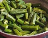 A picture of step 3 of #Tiffin box bhindi with French fries.