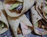 A picture of step 6 of Chicken roll with tortilla.