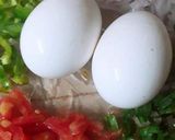 A picture of step 2 of Egg vagitable chela.