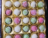 A picture of step 7 of Colourful coconut balls.