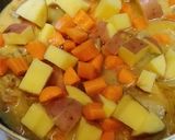 A picture of step 7 of Coconut Chicken Curry.