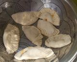 A picture of step 11 of Dumplings With Noodles Soup.