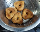 A picture of step 4 of Glaze Dough nuts.