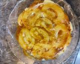 A picture of step 9 of Peach Swiss roll Ice cream Cake.