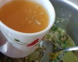 A picture of step 4 of Orange pulao.