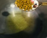 A picture of step 1 of Gobi Aalo.