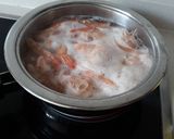Foto del paso 2 de la receta Merluza con gambas y guisantes